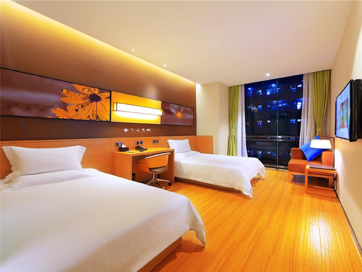 Iu Hotel Hezhou Bus Terminal Extérieur photo